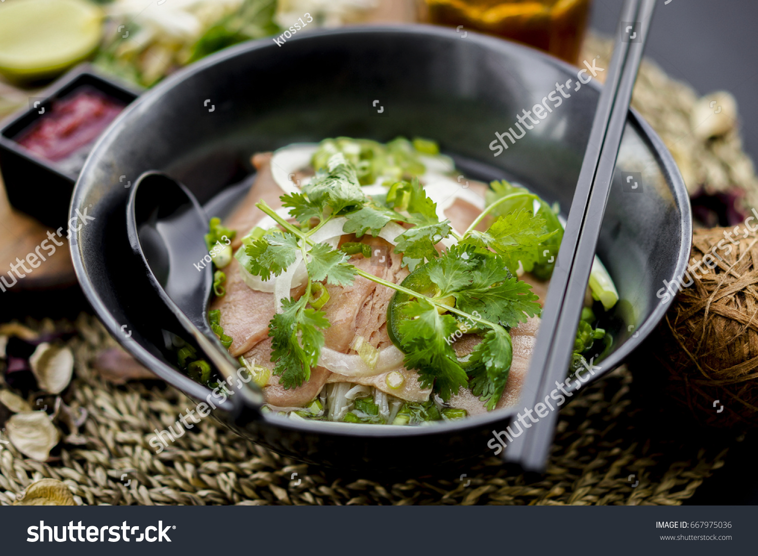 Pho is a famous Vietnamese traditional food in which rice vermicelli served with rare or well done beef and hot tasty soup and fresh vegetable.