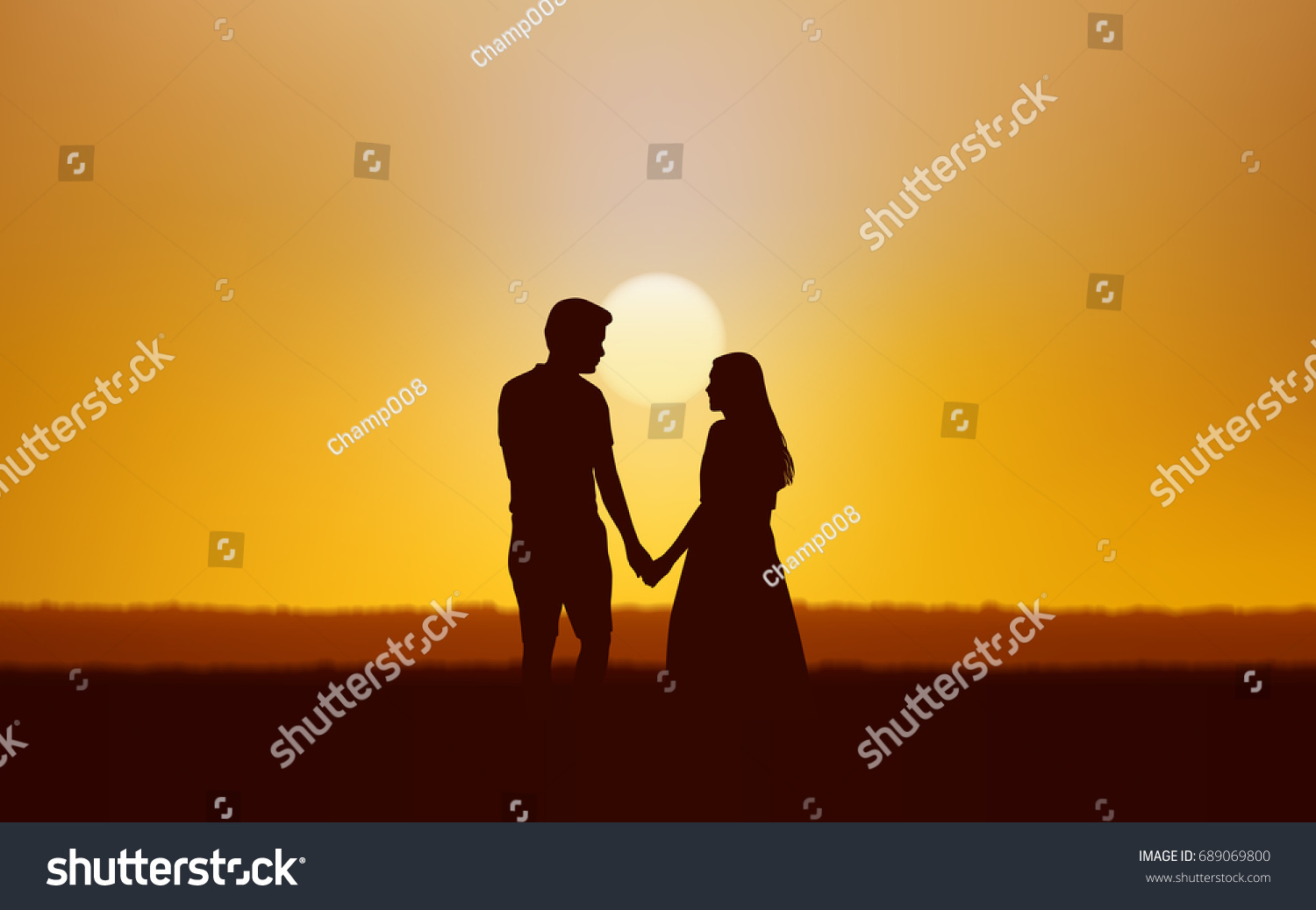 Silhouette couple man and woman holding hand walking together under sunset sky background