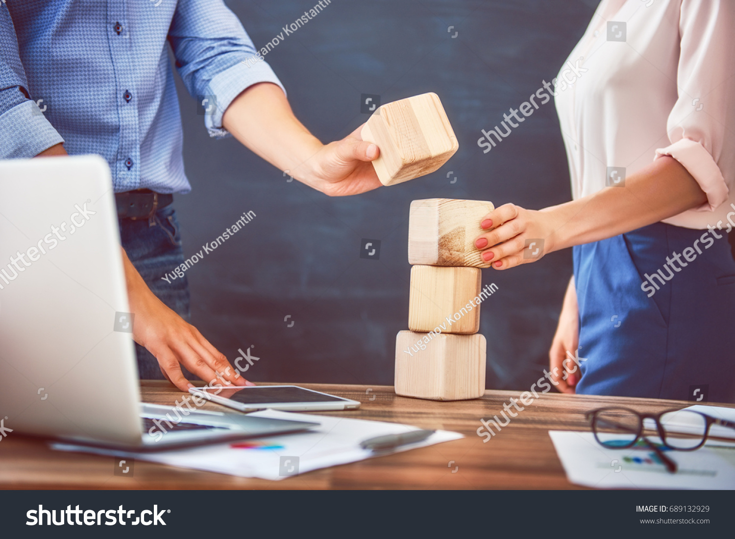 Two business persons plan a project. Team work in office.