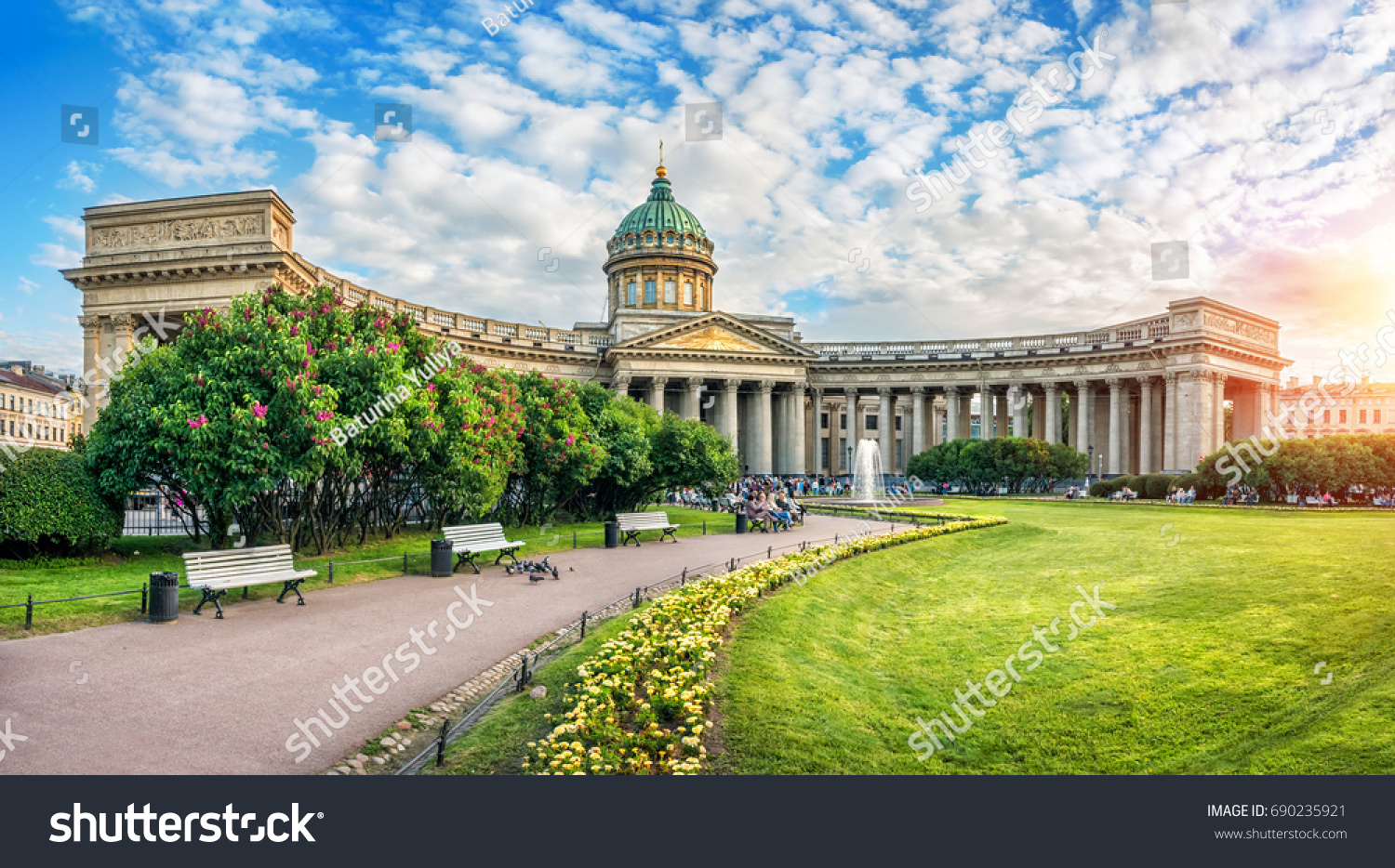 A quiet summer sunny evening at the Kazan Cathedral in St. Petersburg and lilac bushes