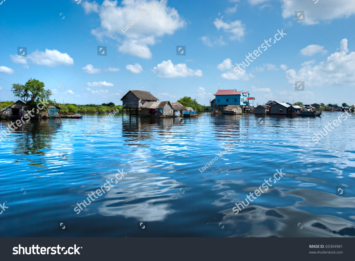 Floating House and Houseboat on the Tonle Sap lake between Battambang and Siem reap. Cambodia.