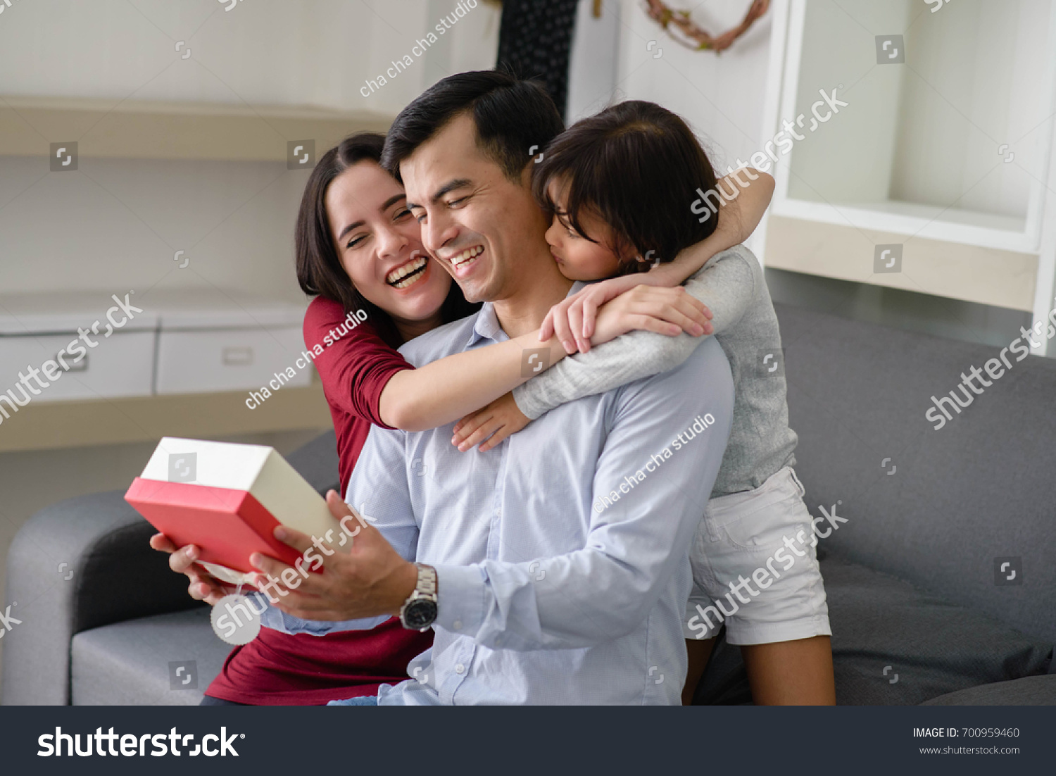 Father's day.Happy family  Activity of family at home .Daughter have a gift for daddy.