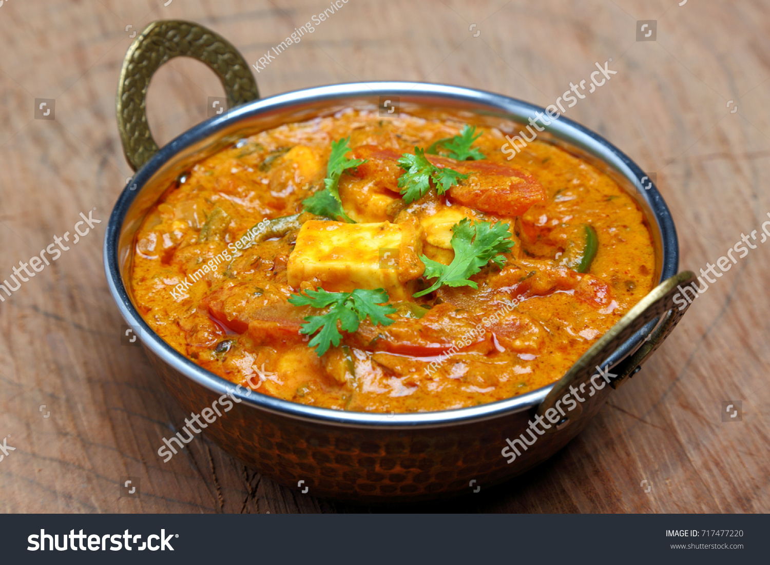 Indian Food or Indian Curry in a copper brass serving bowl.
