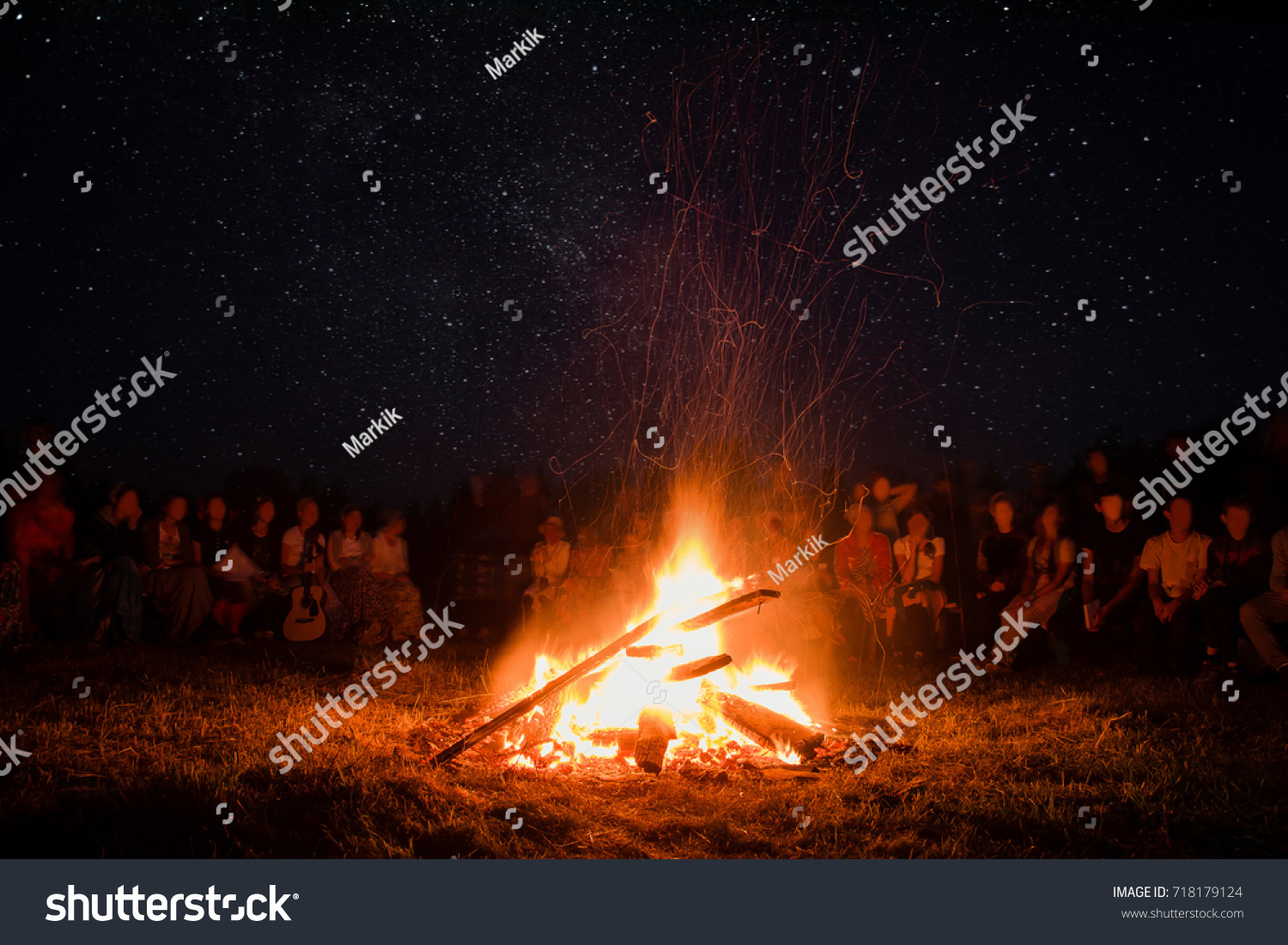 beautiful scenery of night vision. a bonfire around people  the concept of recreation