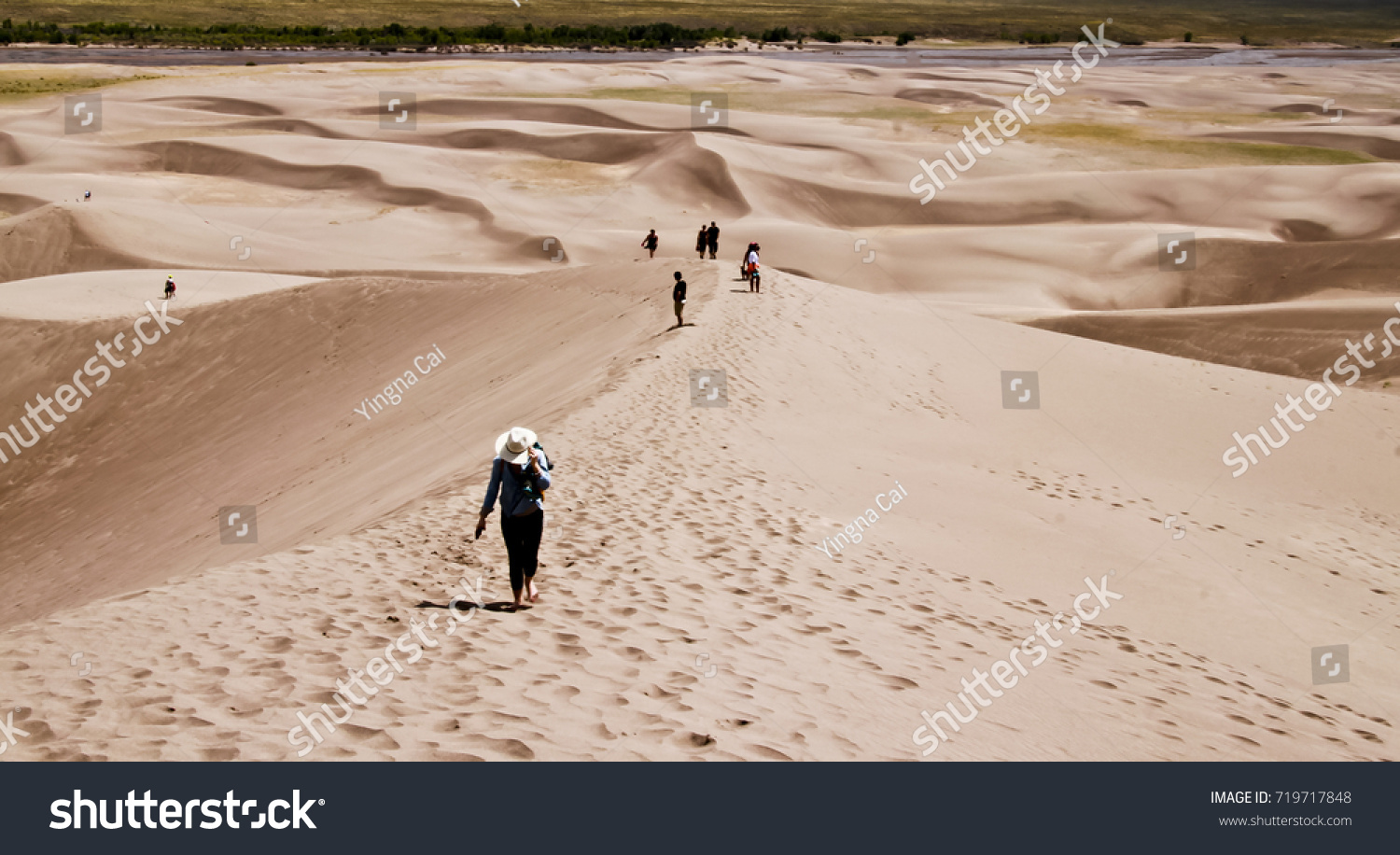 Hikers on Sand dune in Great sand dune national park colorado