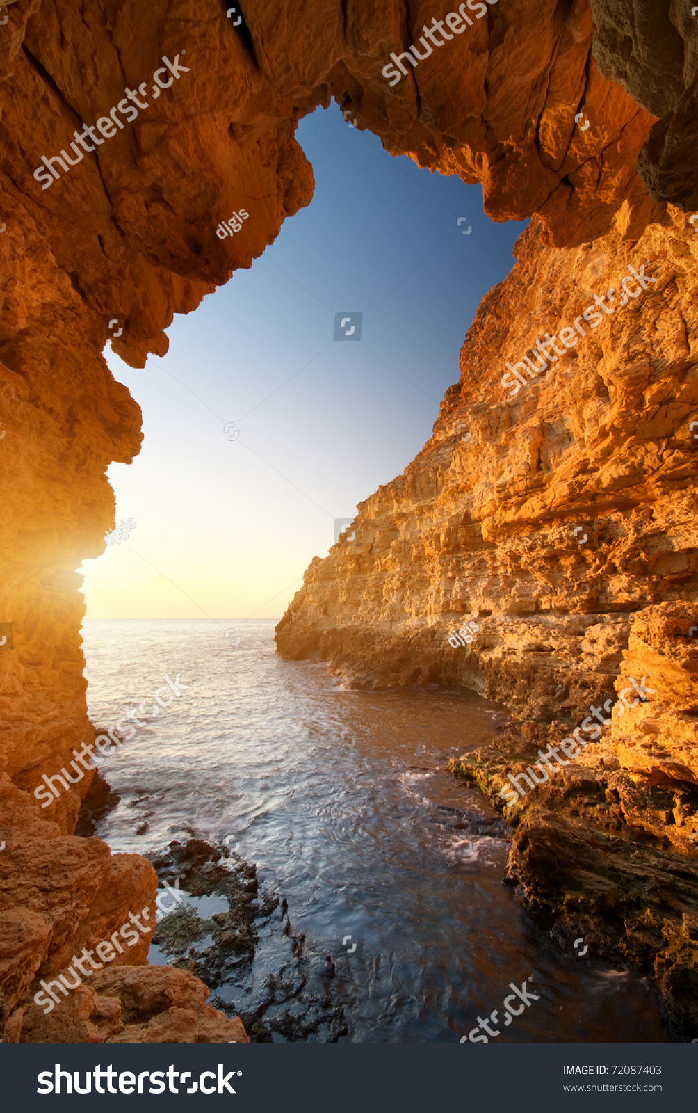 Sunset into grotto. Nature composition.