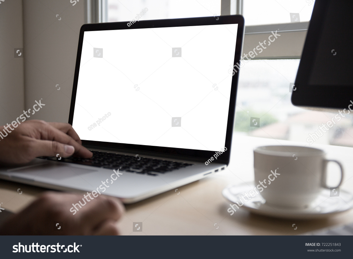 young man working Businessman using a desktop computer of the blank screen