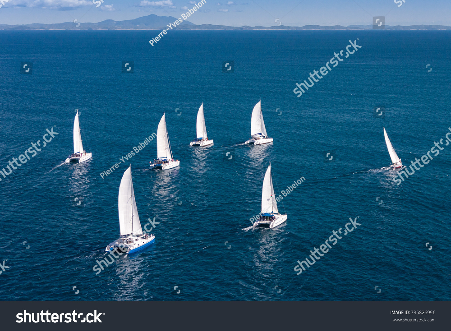 Regatta sailboat and catamaran in Mozambique Channel
