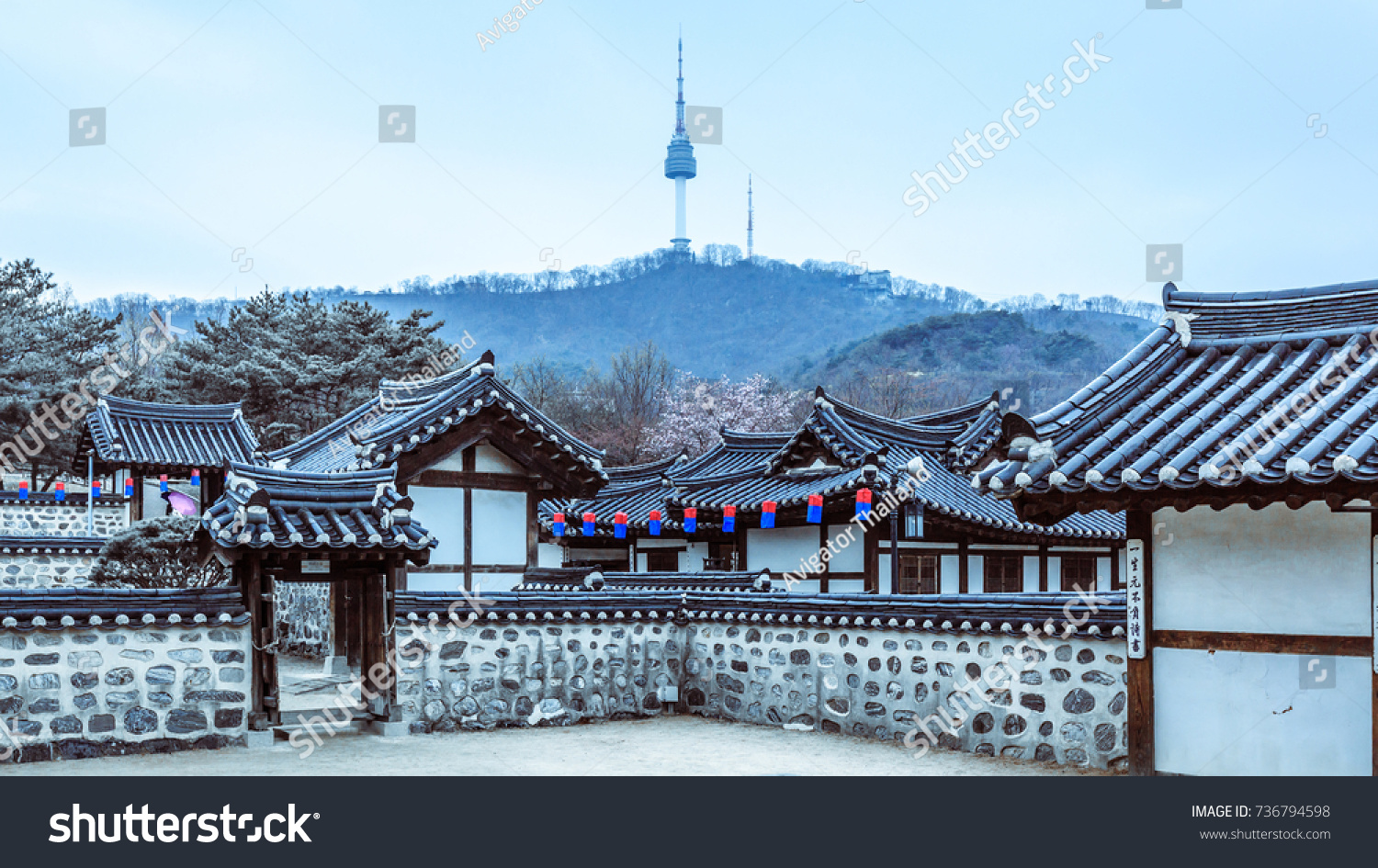 Korea Old House traditional house at winter  Namsangol Hanok Village and Seoul Tower background  Seoul  South Korea.