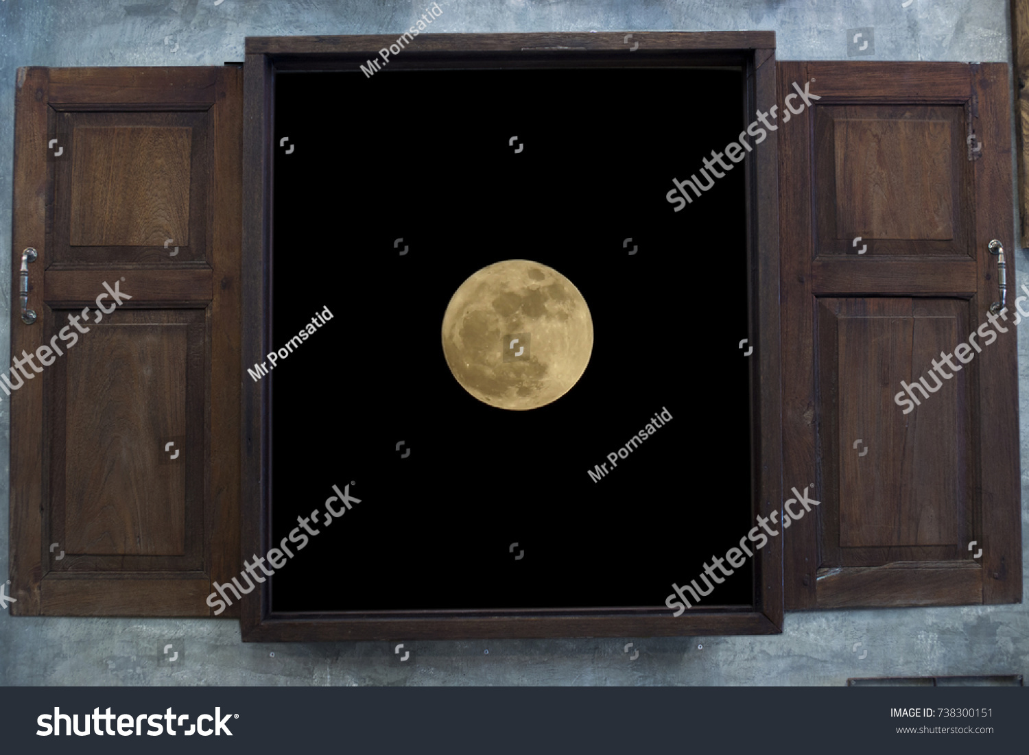 view of a moon through Old grunge wooden window