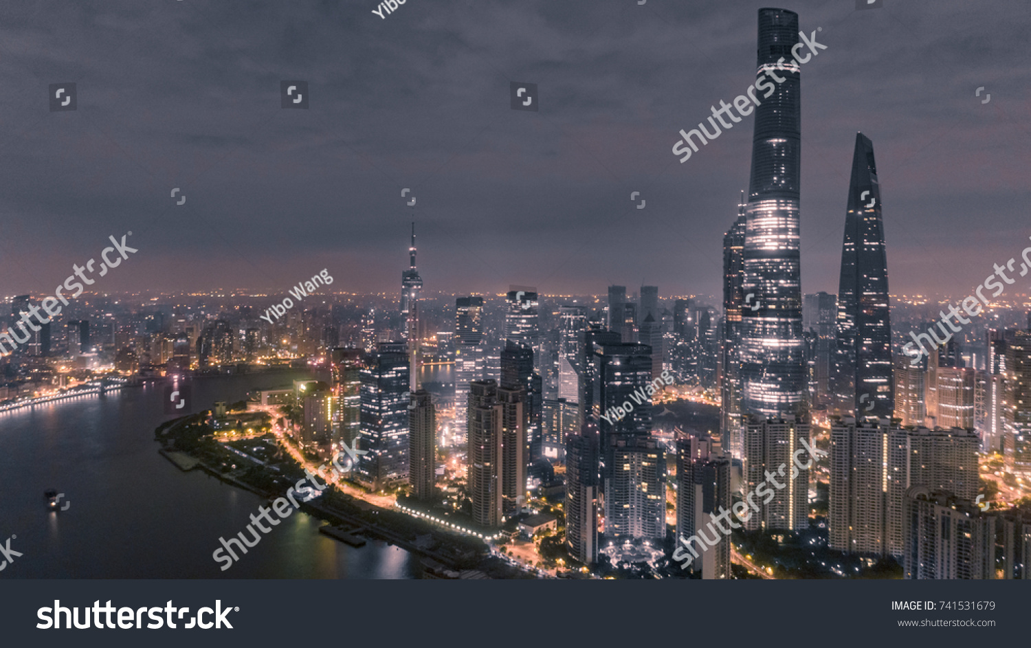 aerial view of skyscrapers at night in Shanghai city