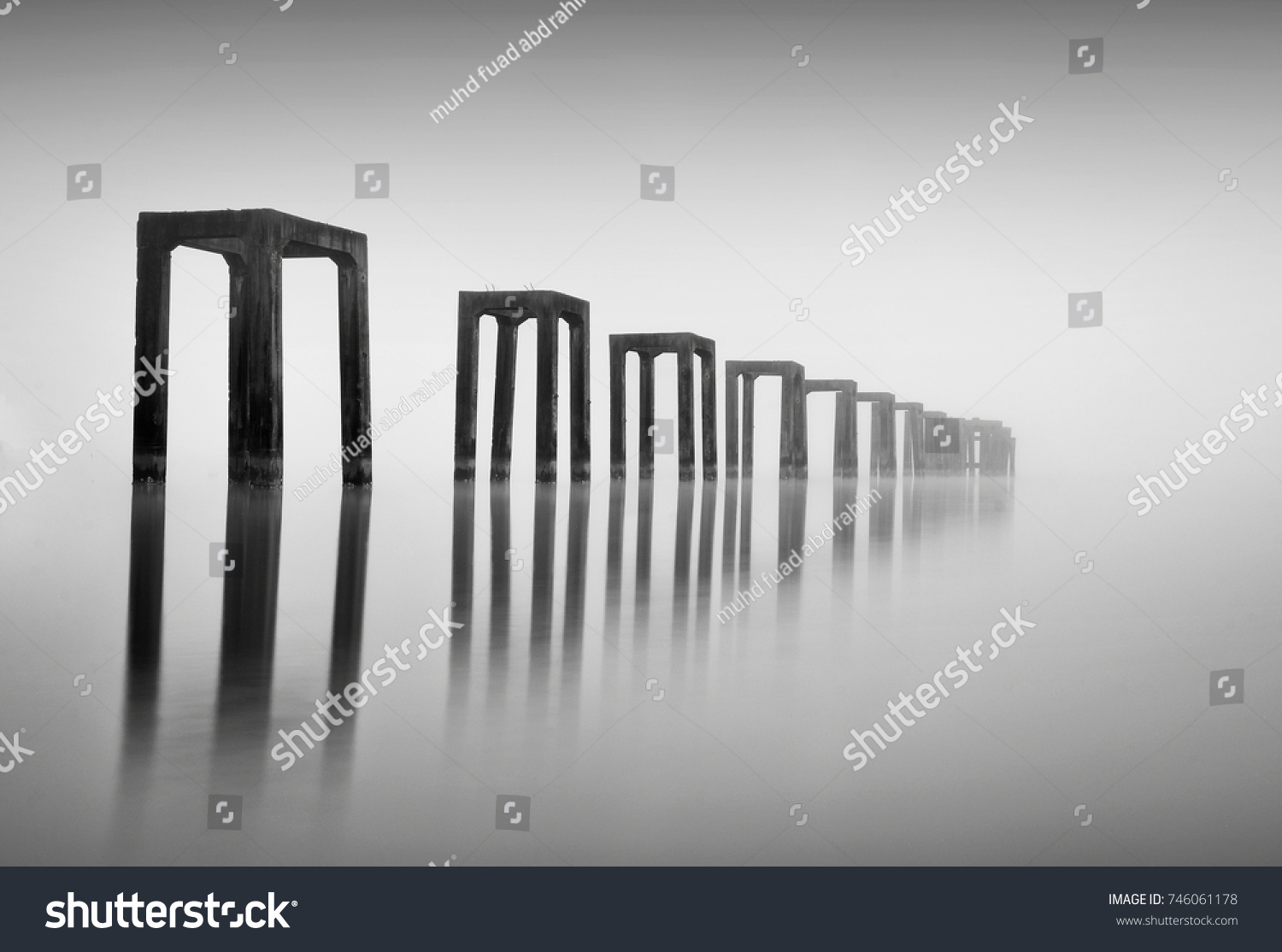 Fine art image in black & white of abandon jetty at Tumpat Kelantan Malaysia. Soft Focus due to long exposure.