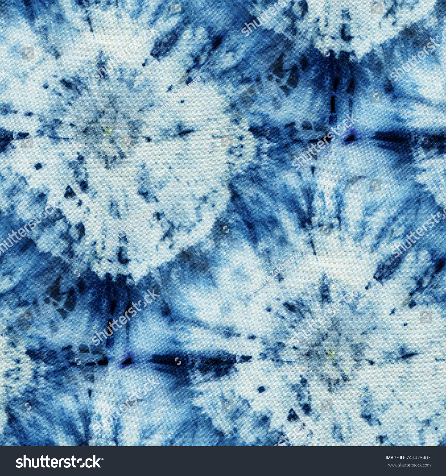 Seamless tie-dye pattern of indigo color on white silk. Hand painting fabrics - nodular batik. Shibori dyeing.