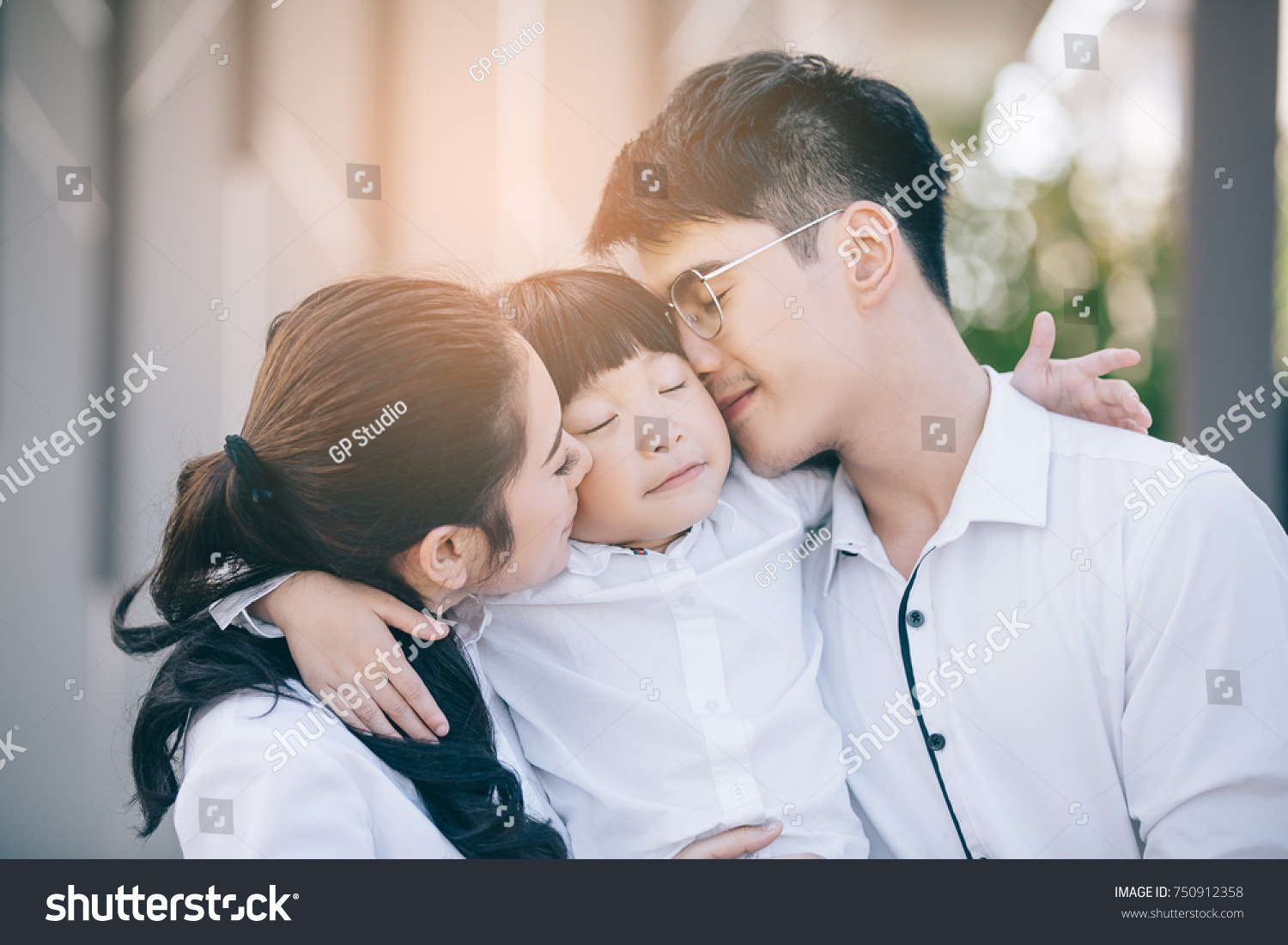 Asian family Happy with child over house background