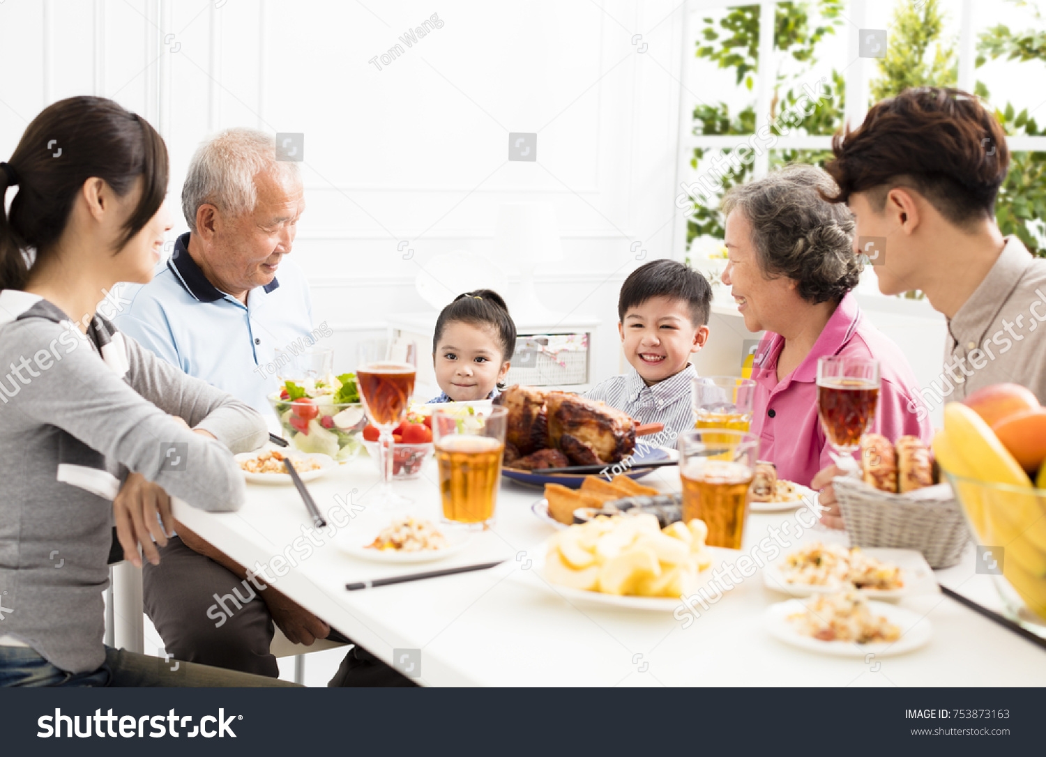 happy asian family having dinnerÂ at home
