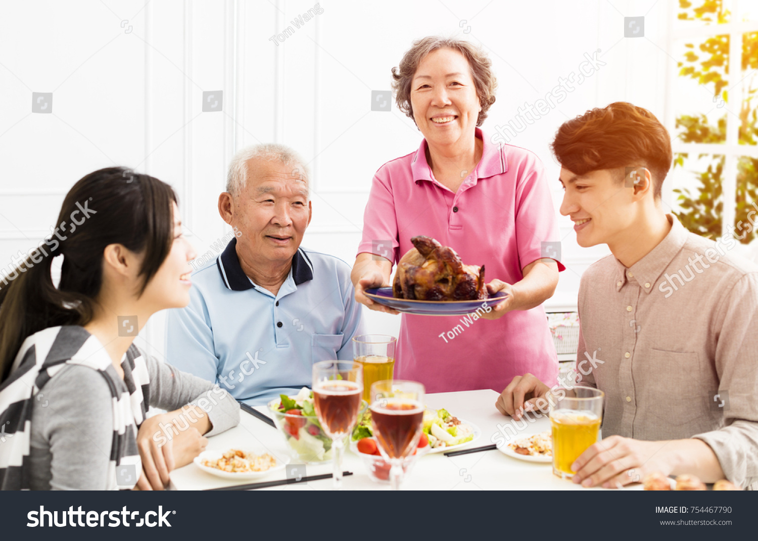 Happy family having dinner together