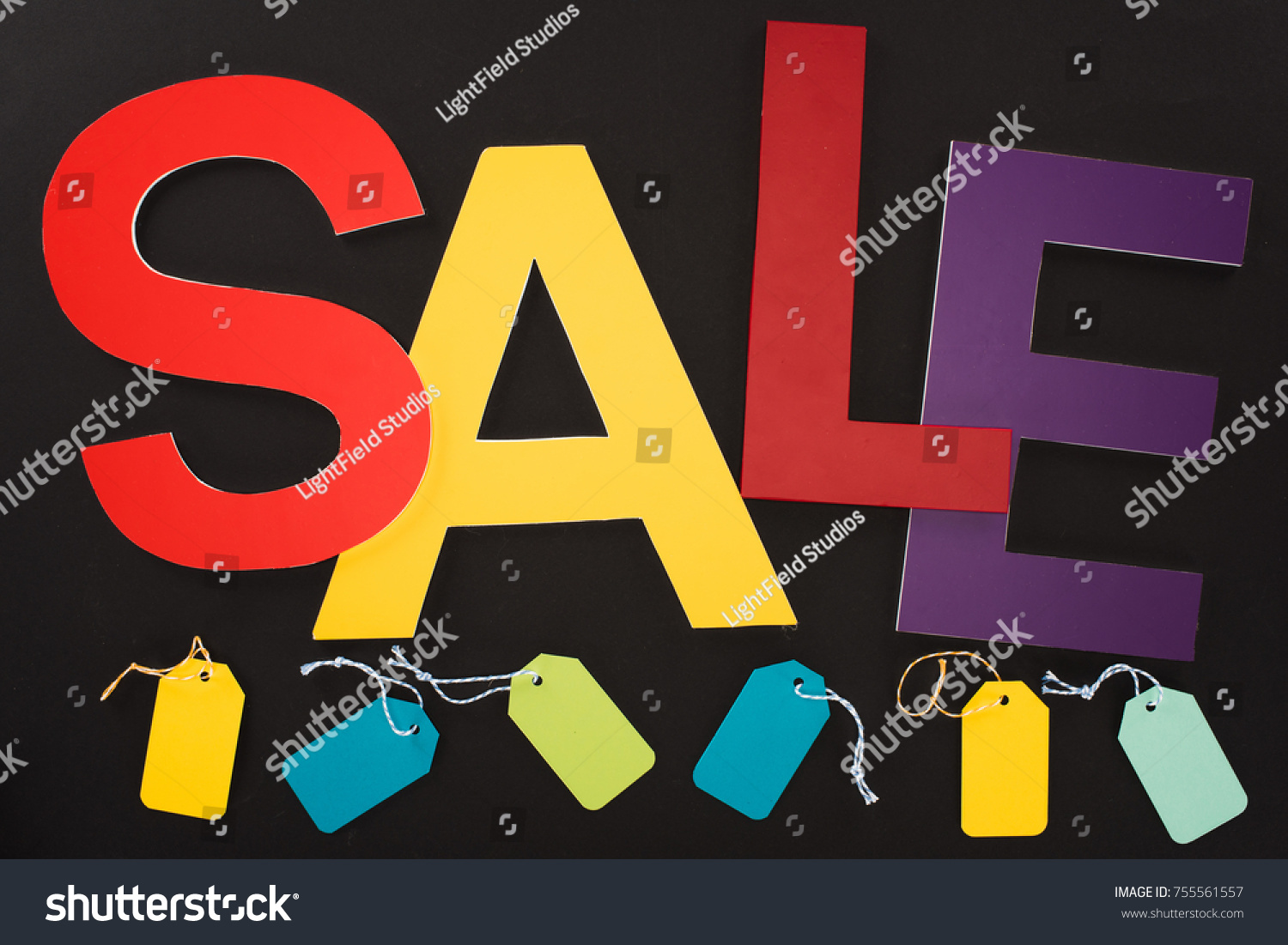 top view of colorful word sale with tags