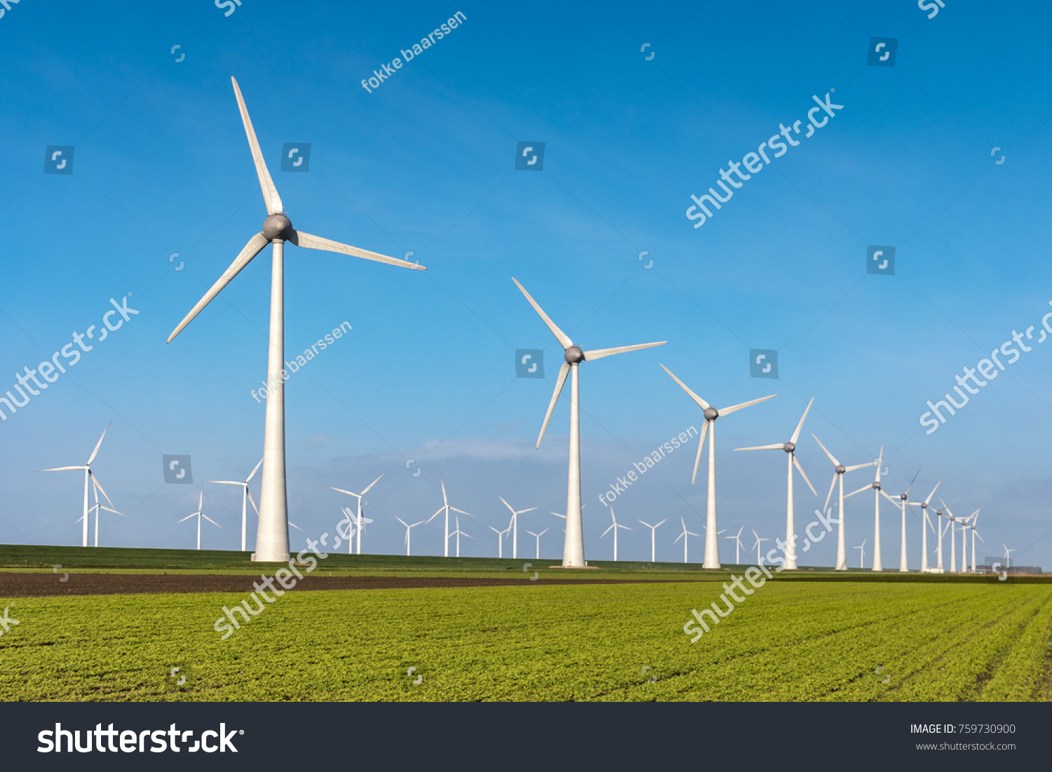 Offshore Windmill farm in the ocean  Westermeerwind park   windmills isolated at sea on a beautiful bright day Netherlands Flevoland Noordoostpolder