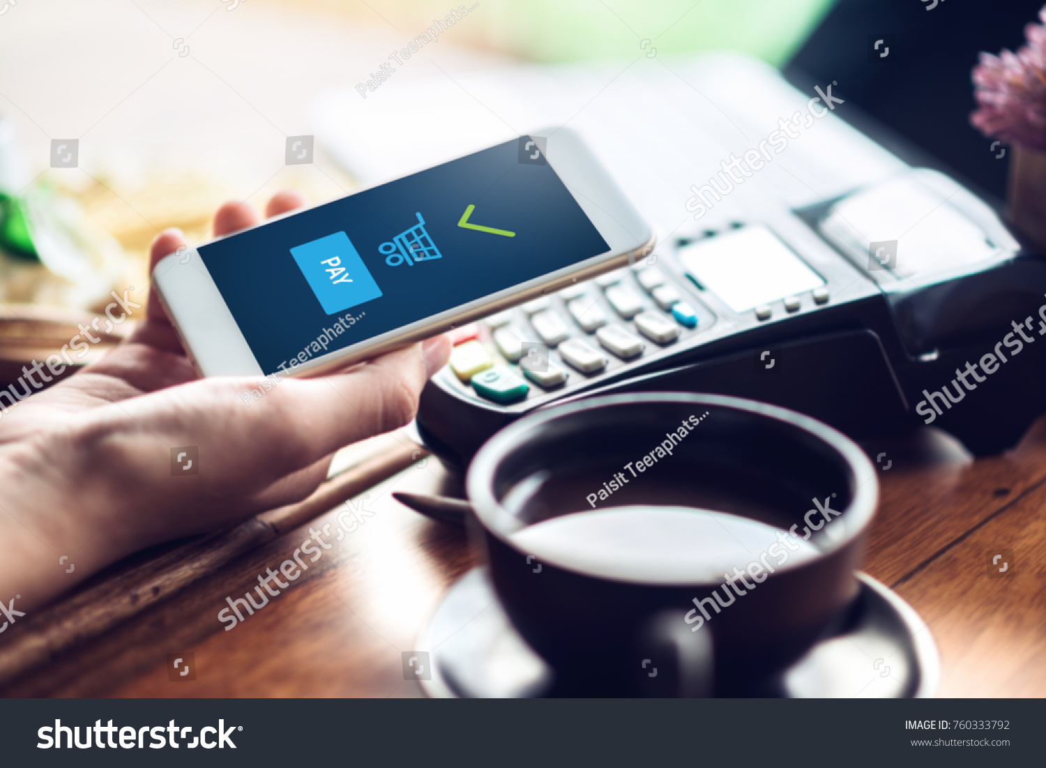 Hand and mobile payment in coffee shop  mobile payment concept