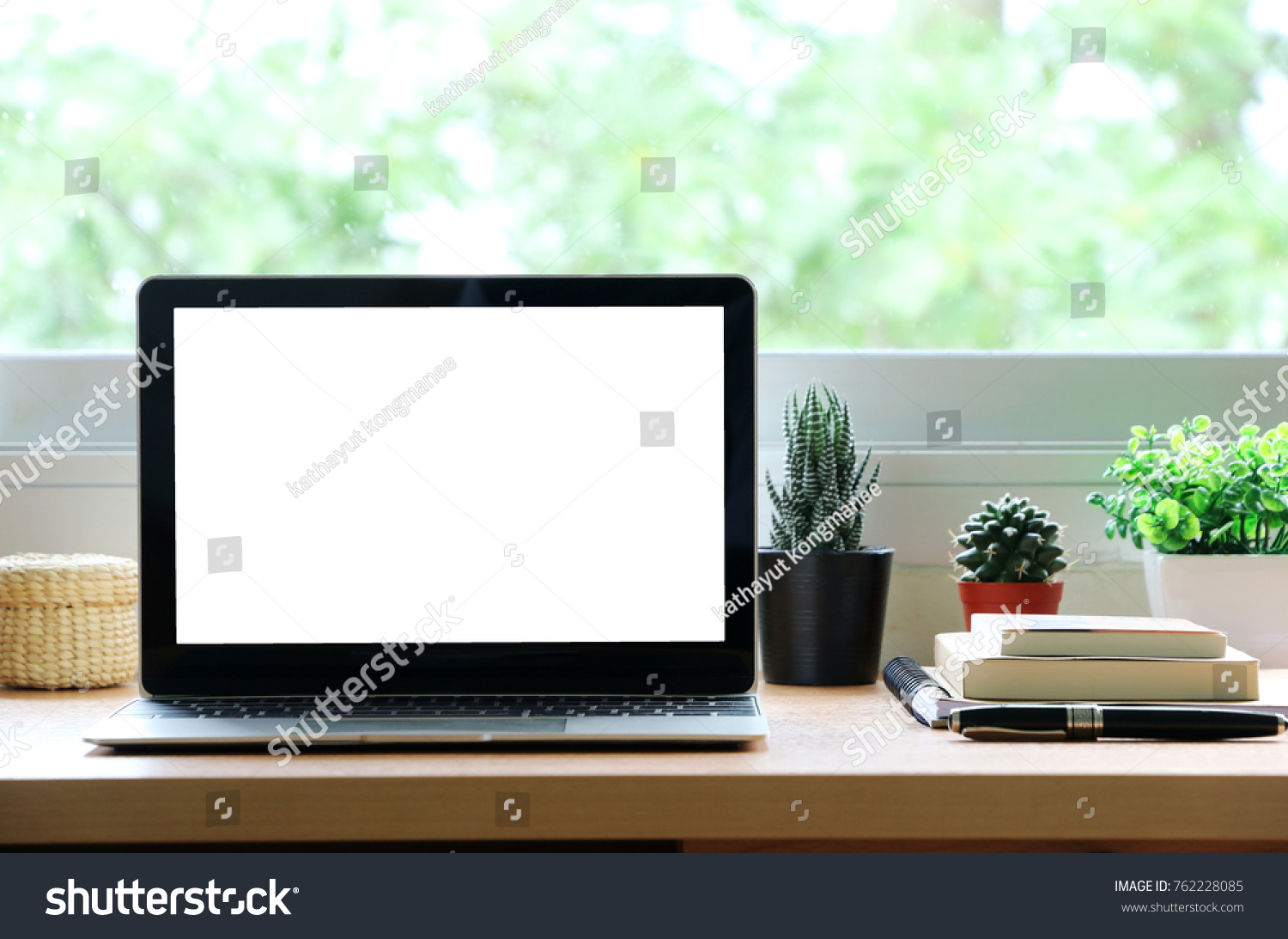 blank screen laptop on the desk at
home office