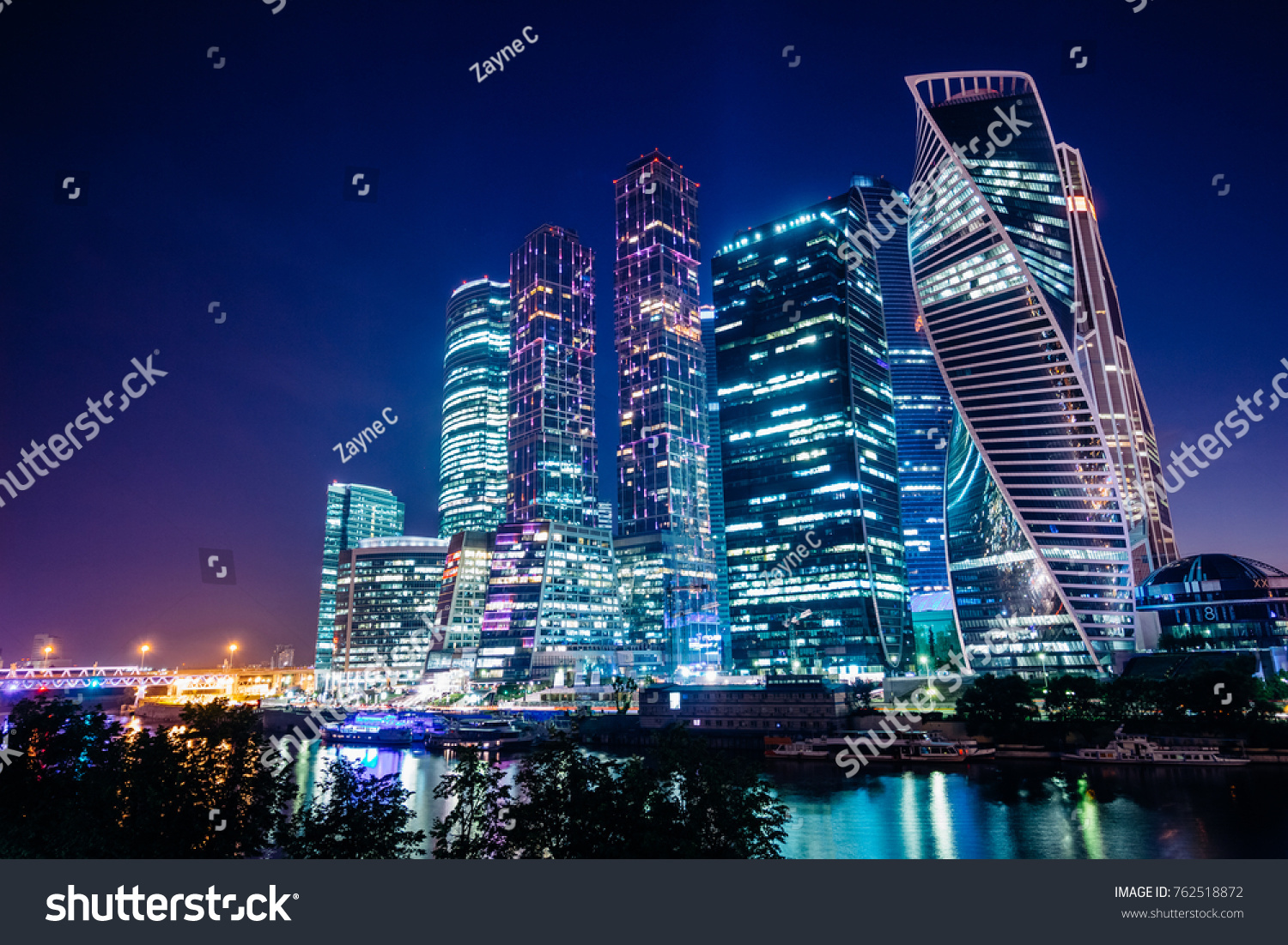 Cityscape with business center Moscow city on the river bank against the background of the night sky
