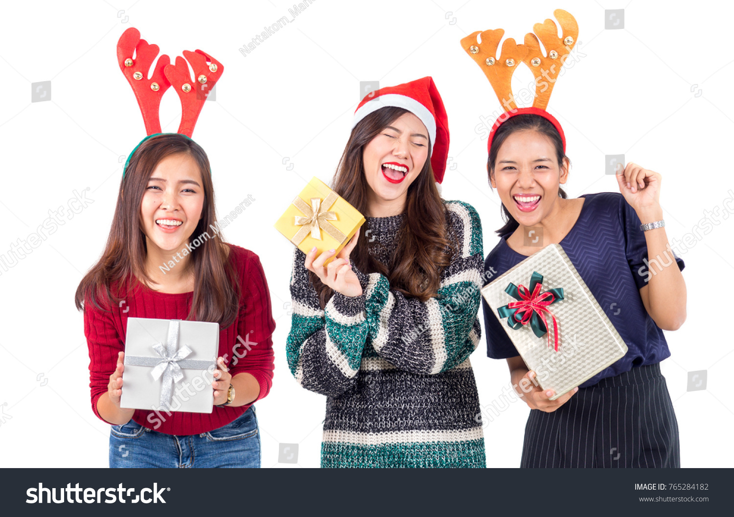 Group young happy asian woman with santa hat holding gift box present for christmas party and celebration isolated on white background merry christmas and happy new year concept