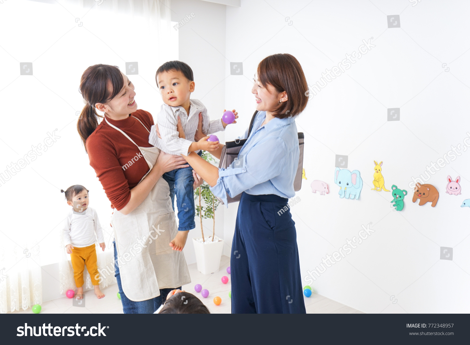 Mothers taking children to and from kindergarten