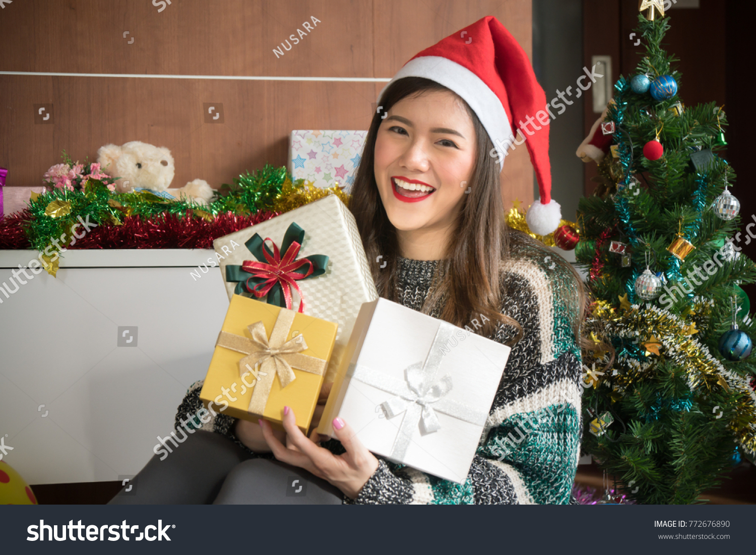 Asian woman in Christmas holiday party with gift
