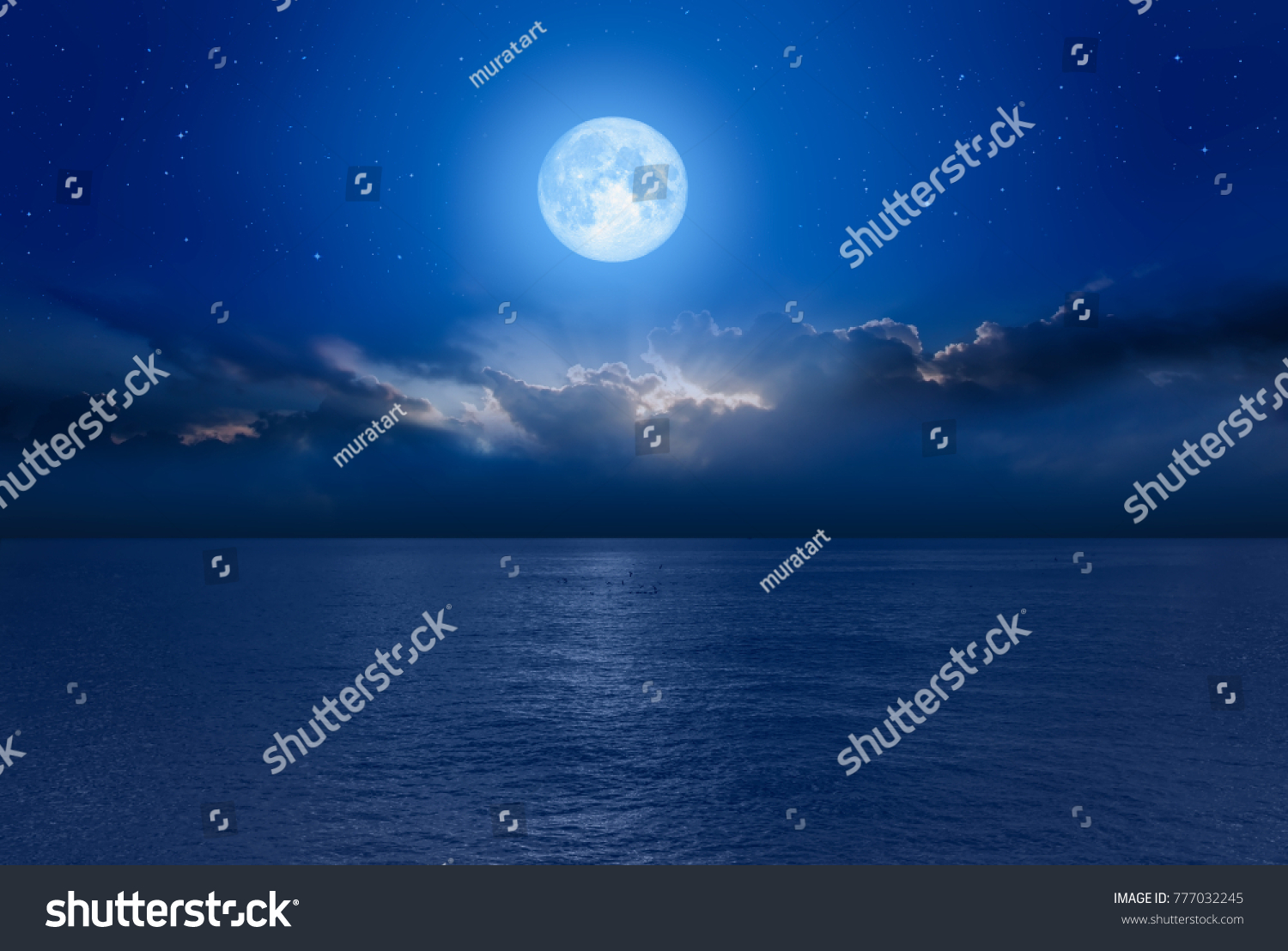 Night sky with Blue moon in the clouds "Elements of this image furnished by NASA