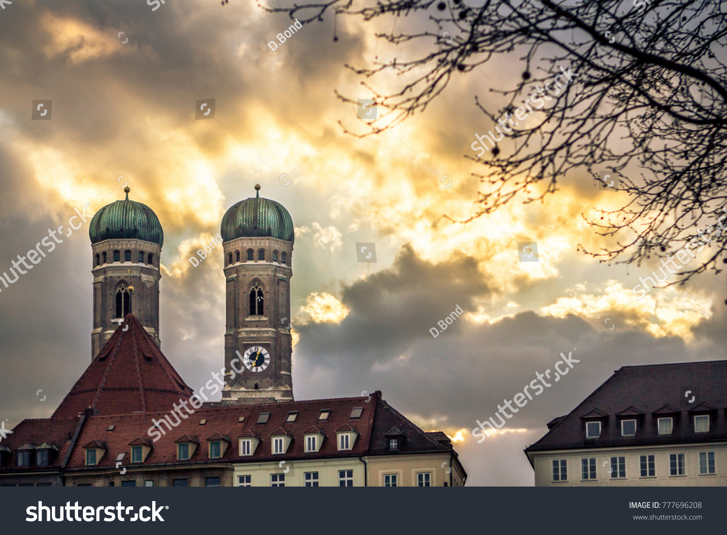 Frauenkirche - Cathedral of Our Dear Lady in Munich with sunset in the background Germany