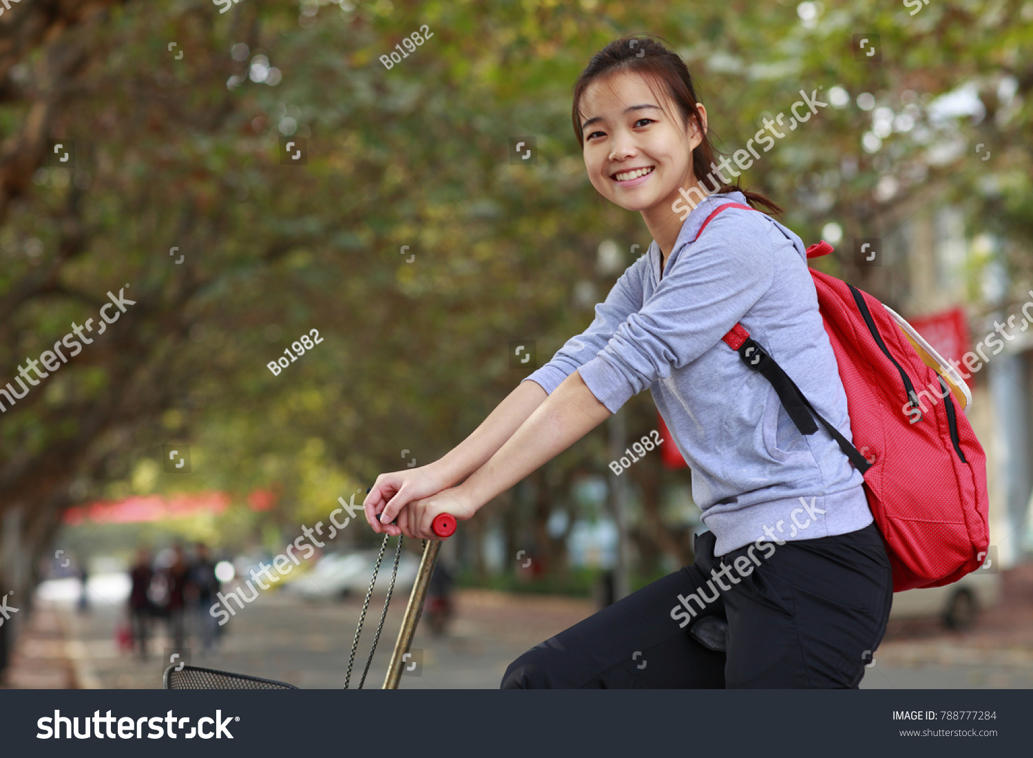 pretty college student smile at camera in campus