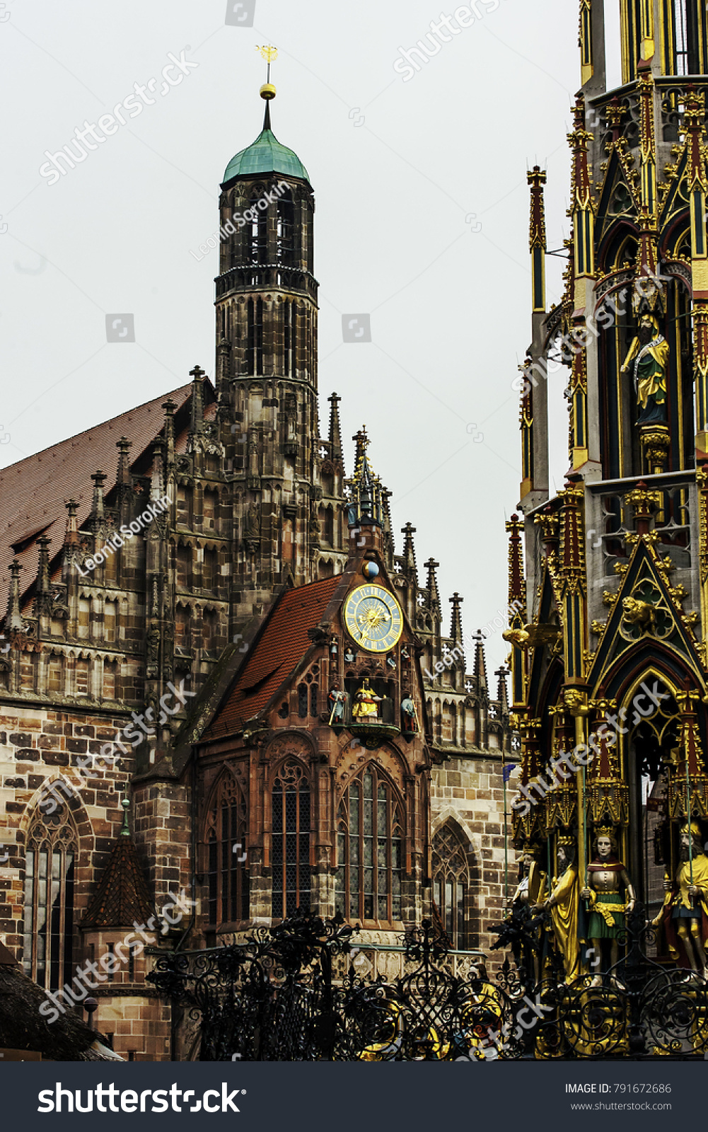 Facade of Frauenkirche Church of Our Lady is a catholic church and Schoner Brunnen fountain in Hauptmarkt market in Nuremberg  Germany. Gothic architecture in Bavaria.