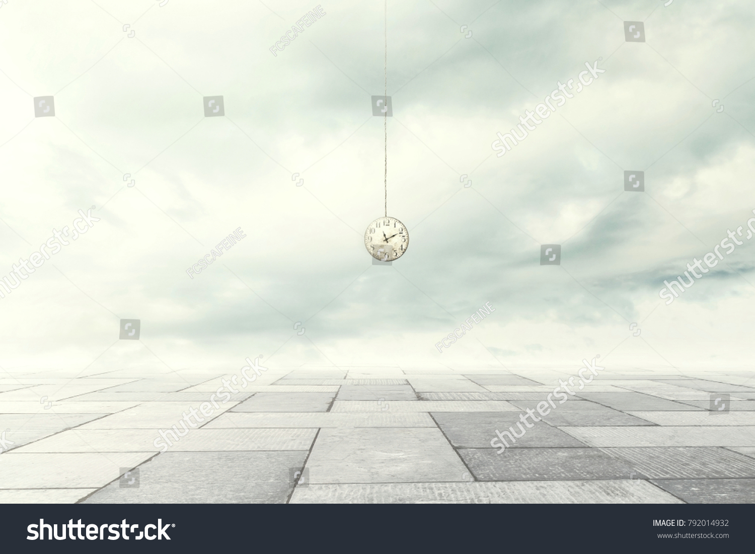 surreal moment of a clock coming down from the sky