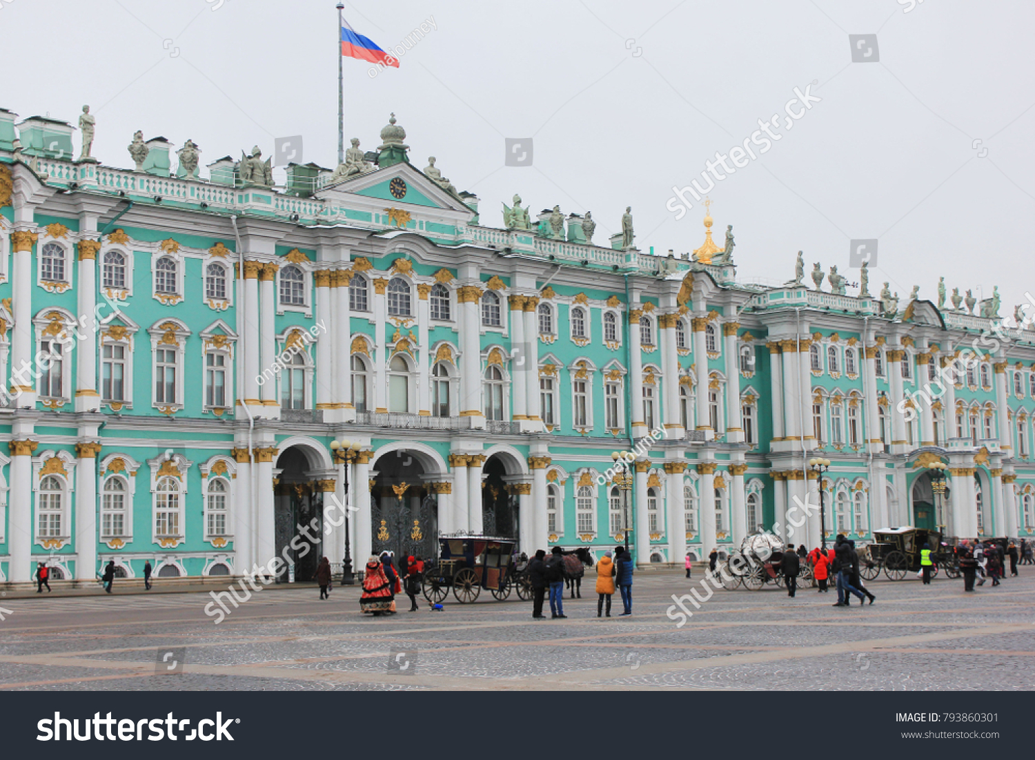 Winter Palace (Hermitage Museum) View from Palace Main City Square in Saint-Petersburg Russia. Historical Royal Family Palace Built for Emperor Peter the Great on Winter Time with Tourists Around.