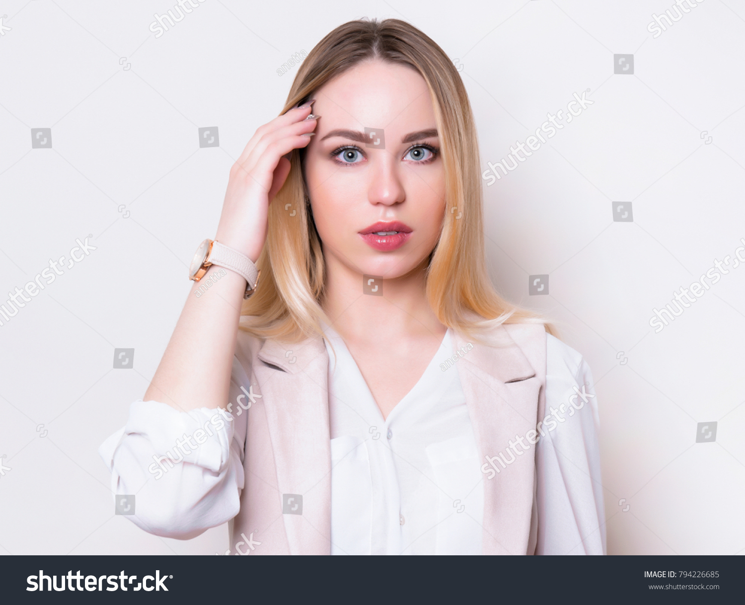 beautiful young woman with long hair wearing wrist watch