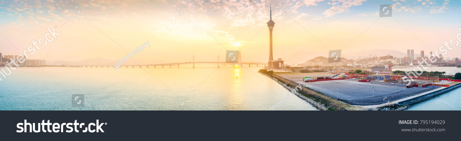 Landscape of Macau at dusk. In the distance is Macau Tower and Sai Van Bridge (Ponte de Sai Van). Taken from Macau-Taipa Bridge (Aodang Bridge). Located in Macau.