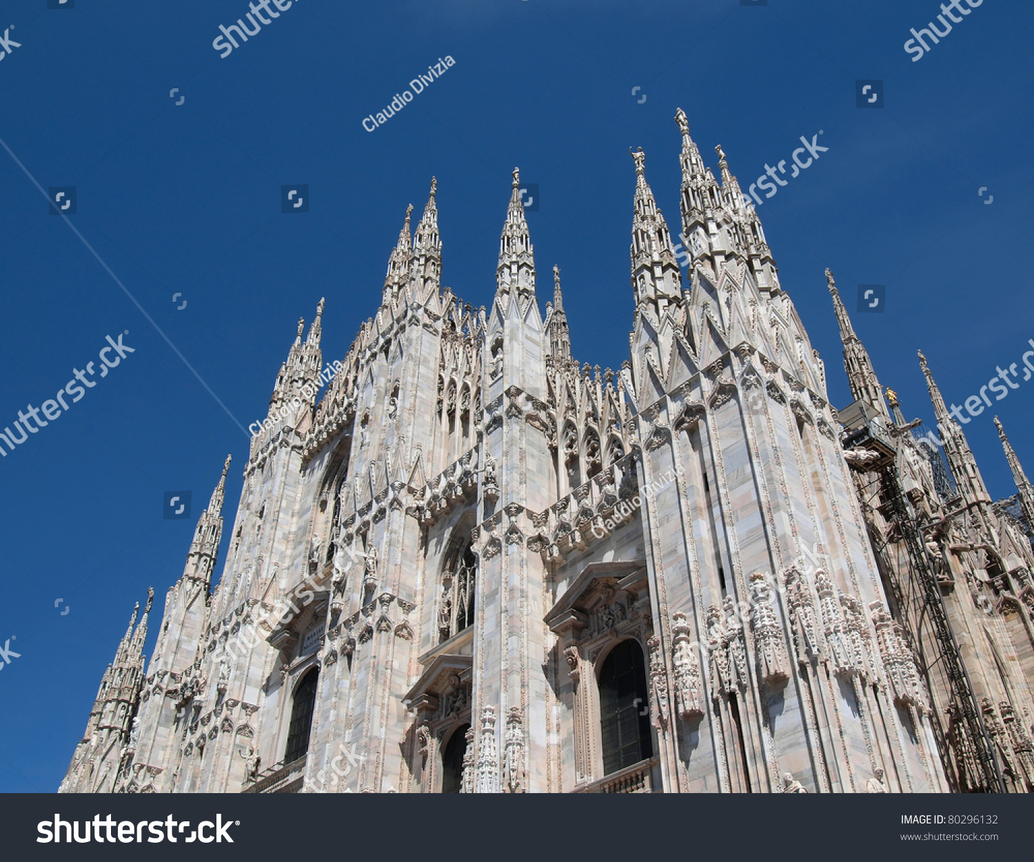 Duomo di Milano dom gothic cathedral church abbey Milan Italy Italia landmark over blue sky