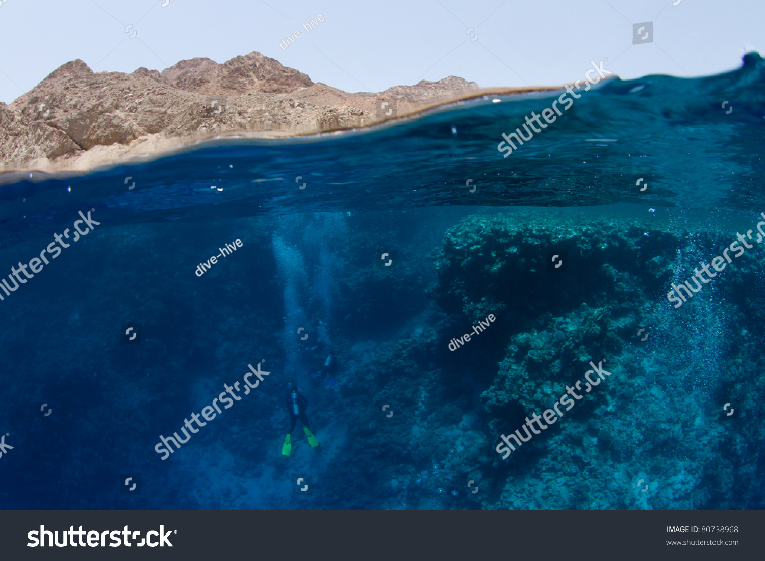 the Blue Hole in Dahab: half mountains half ocean with divers