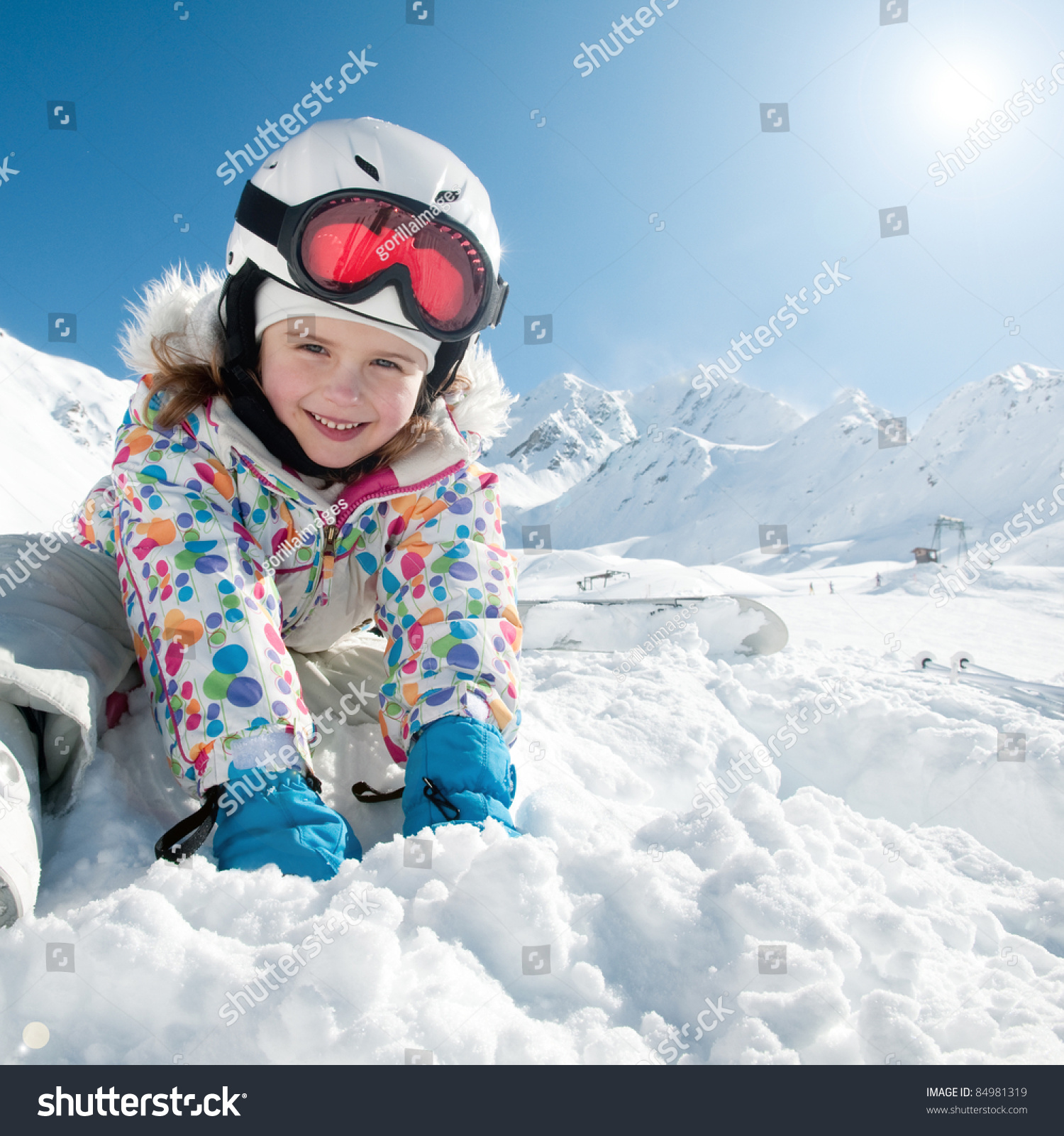 Winter vacation  ski - happy skier playing in snow