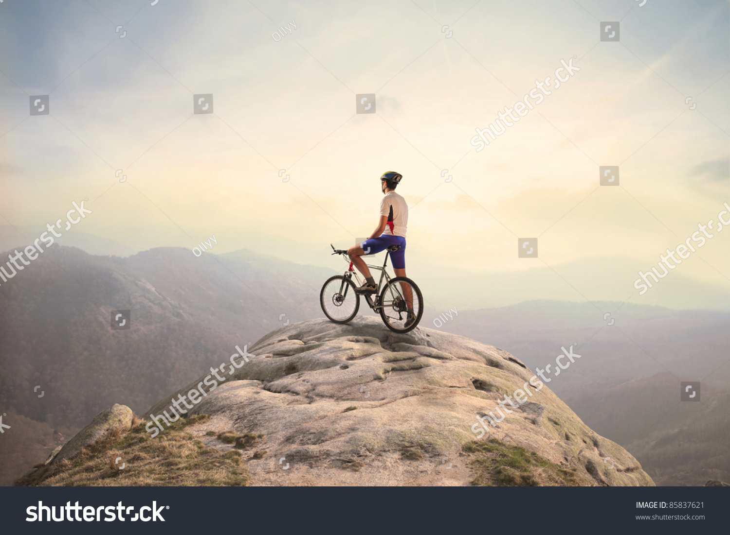 Cyclist on the top of a hill