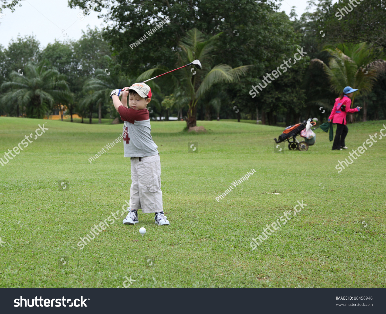 4 years old boy playing golf  Thailand