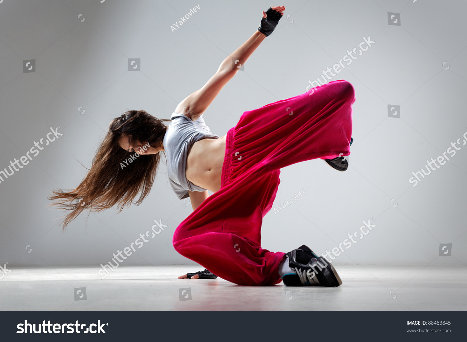 dancer posing on studio background