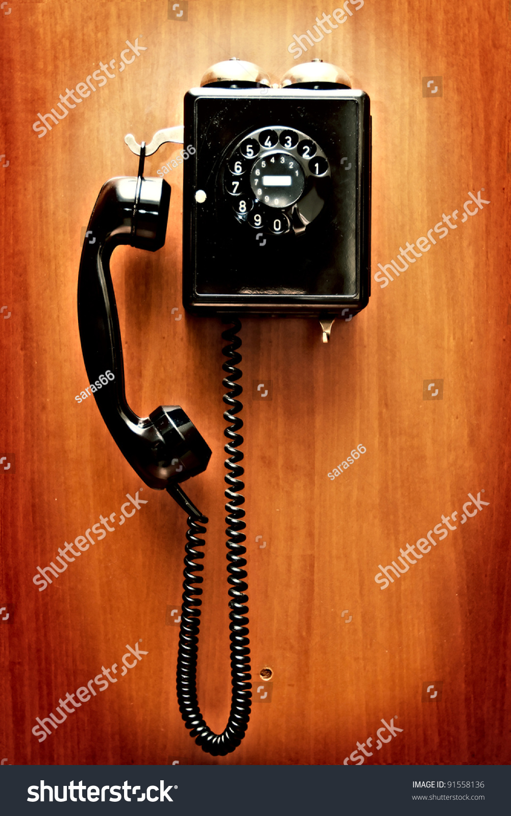 Phone hangs on a wall