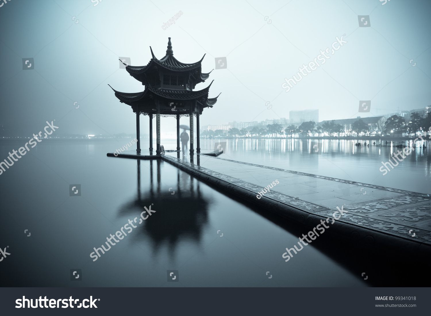 west lake of hangzhou and ancient pavilion at night