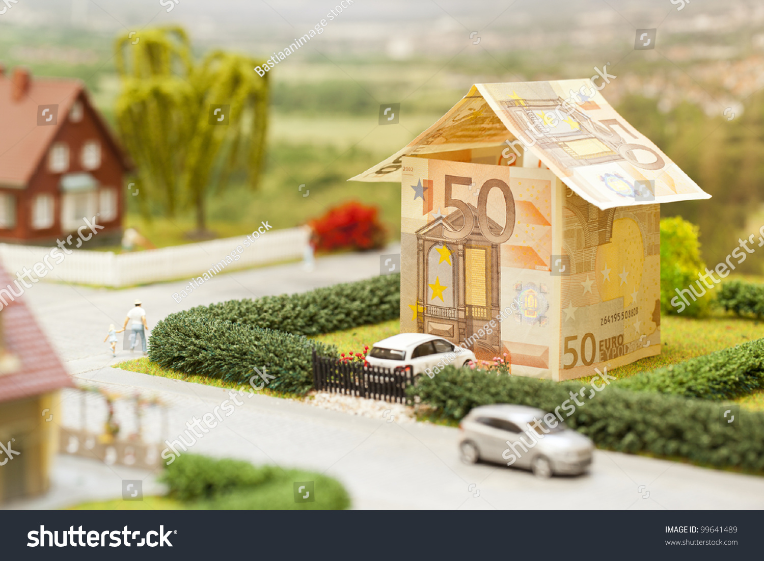 a euro bill house in a green neighborhood scenery