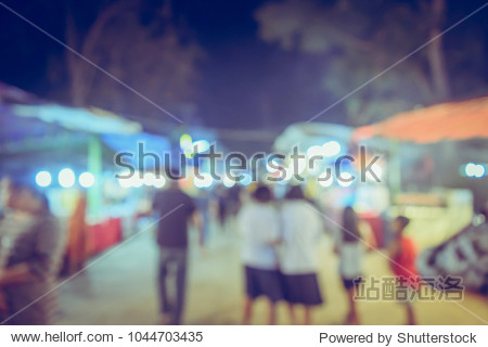 (Vintage tone) Festival Event night time with People in city Blurred defocused Bokeh abstract Background