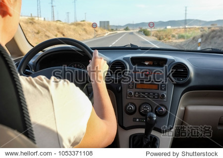 driver woman getting close to no overtaking area at country road
