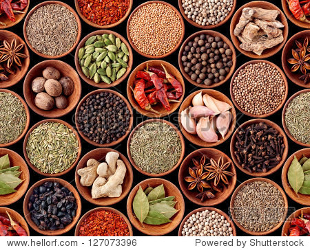 seamless texture with spices and herbs over black background