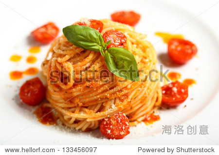 italian pasta spaghetti with tomato sauce basil and cheese on