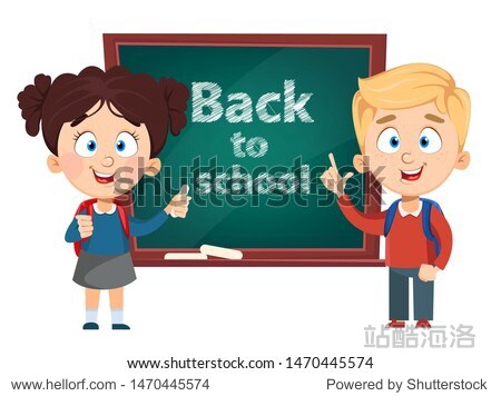 back to school. cute boy and girl standing near blackboard.